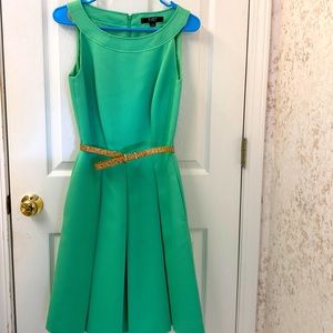 Alex Marie green pleated dress with cork like belt. Size 4. Pockets.